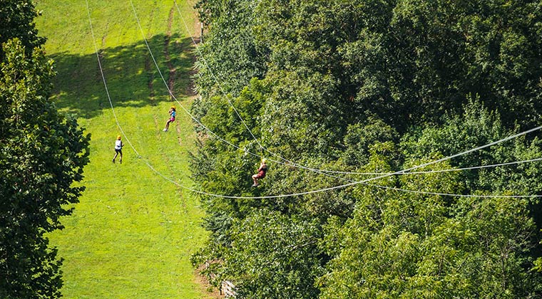 kids on a zip line