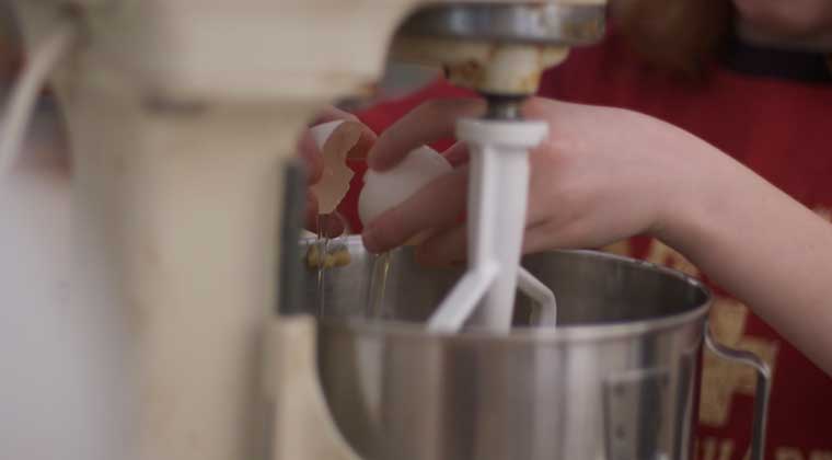 kids making cookies in mixer