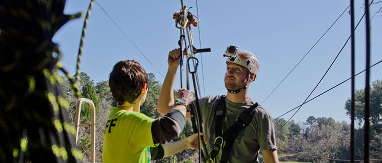 zip line guide and zip line rider