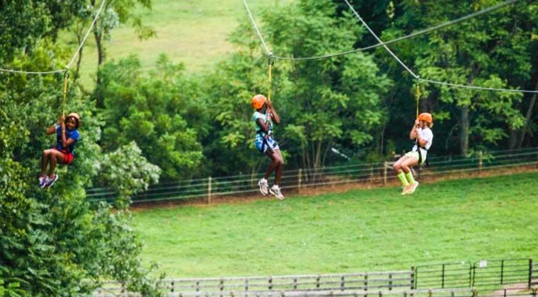 children on zip line