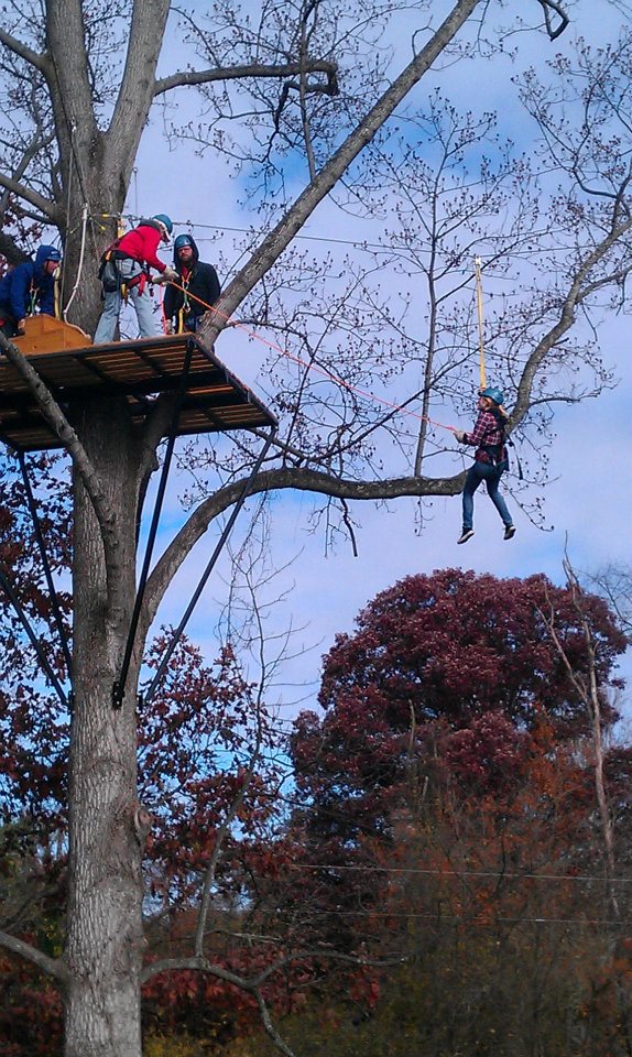 Zipline guide hauling in a stranded rider